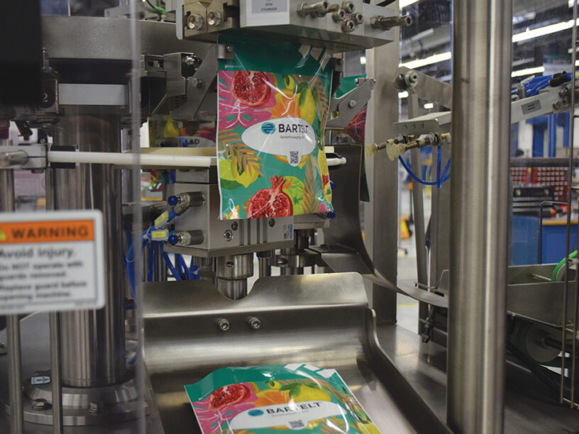 Close up of the BPM-6 pre-made rotary poucher being sealed and discharged